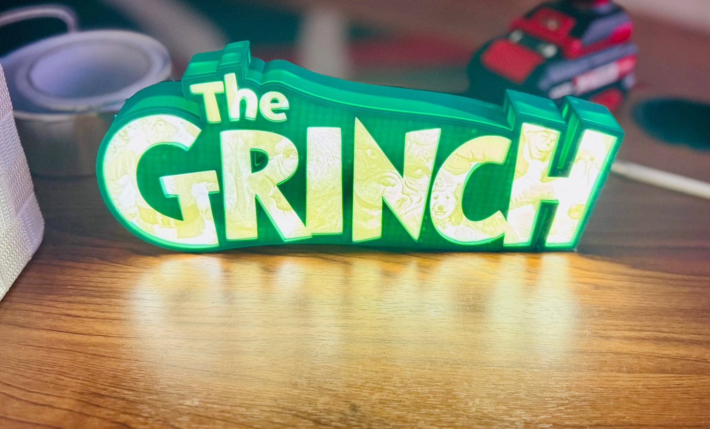 “The Grinch” - Light up Sign/Decoration - with very detailed grinch imagery in the letters! - Michael's 3D World