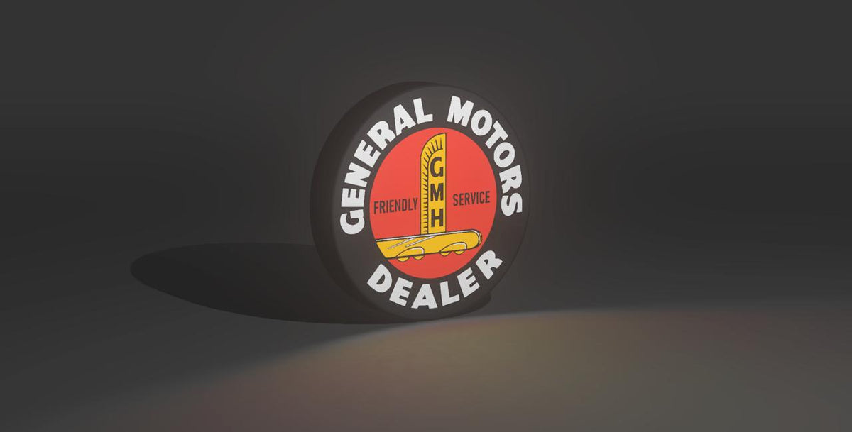 Old school General Motors Dealer LED light box lit up, red and gold GMH dealer logo