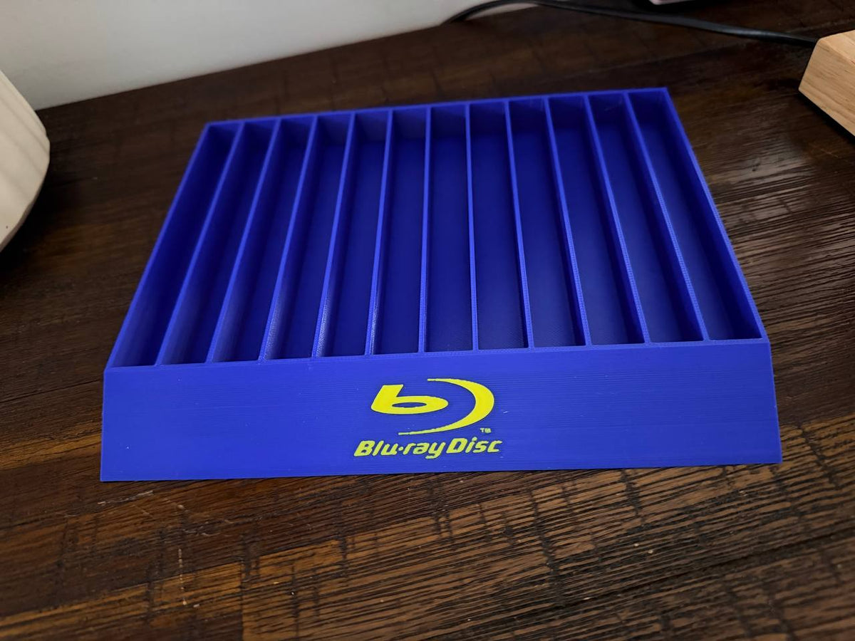 Blu-Ray Disc Logo / Blue base with yellow logo - 12 slot case holder, front view