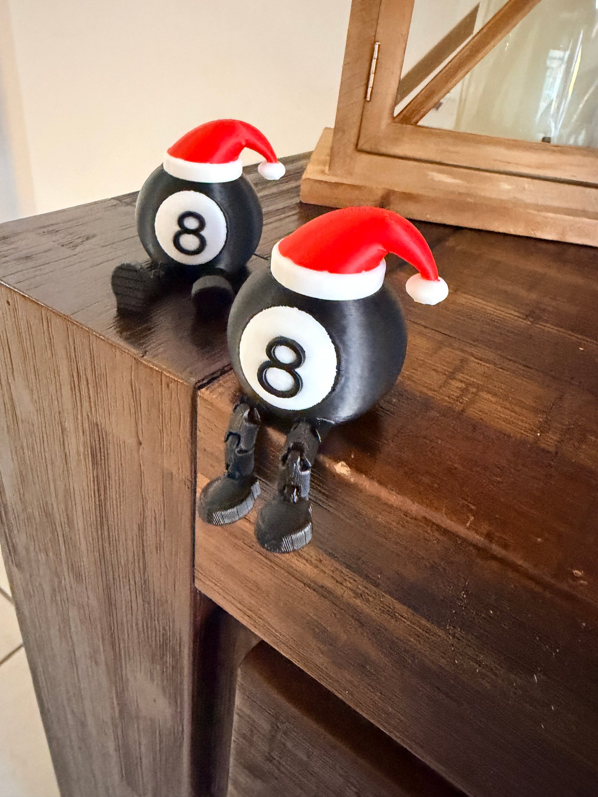 Christmas Fidget Toy - Festive Green Character with Santa Hat Holding 8-Ball - Stress Relief Desk Companion