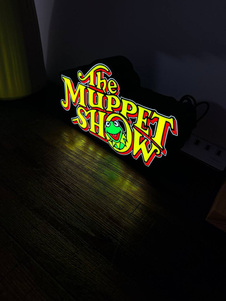 The Muppet Show LED sign close-up showing the colourful logo detail