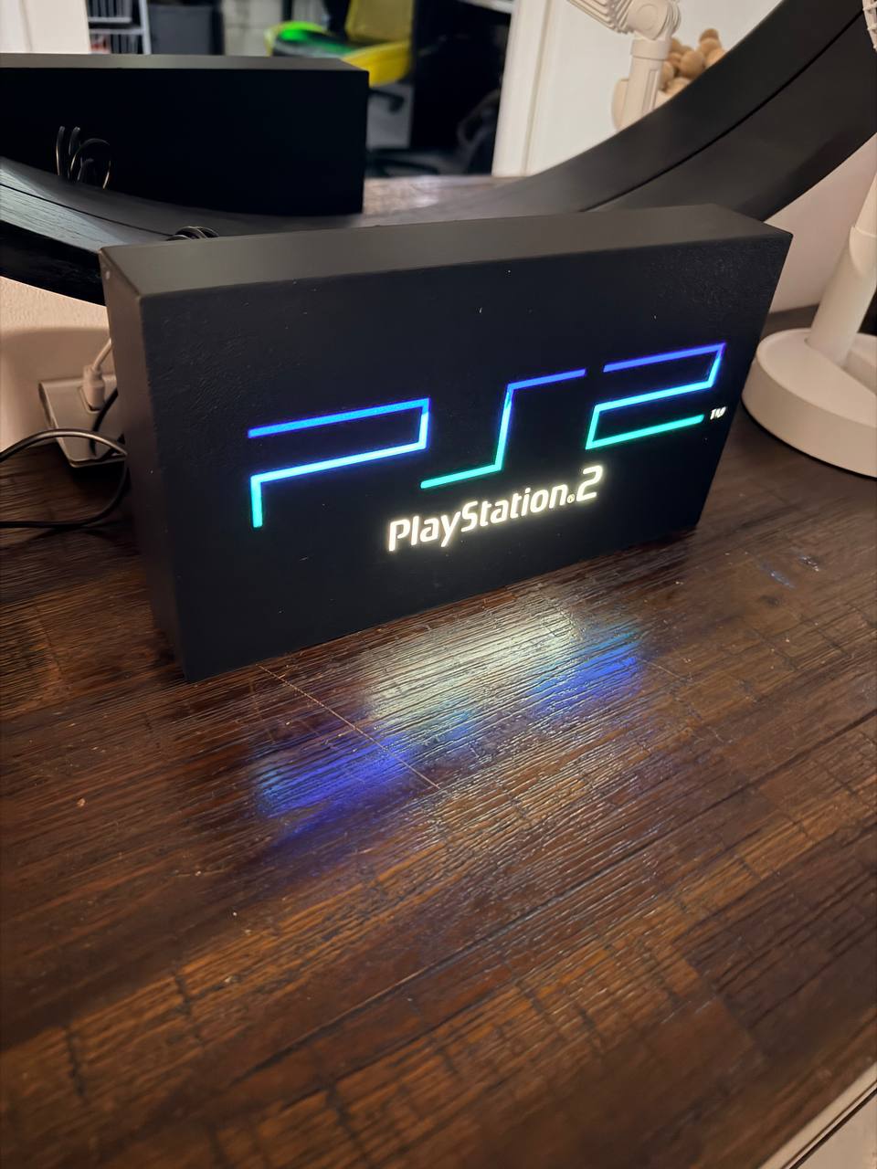 Sony PlayStation 2 LED light-up sign (full logo), angled view showing the 3D-printed body