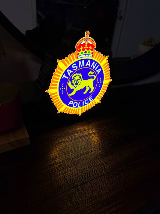 Tasmania Police LED light-up sign - TAS police badge with sunburst, blue roundel, lion and crown